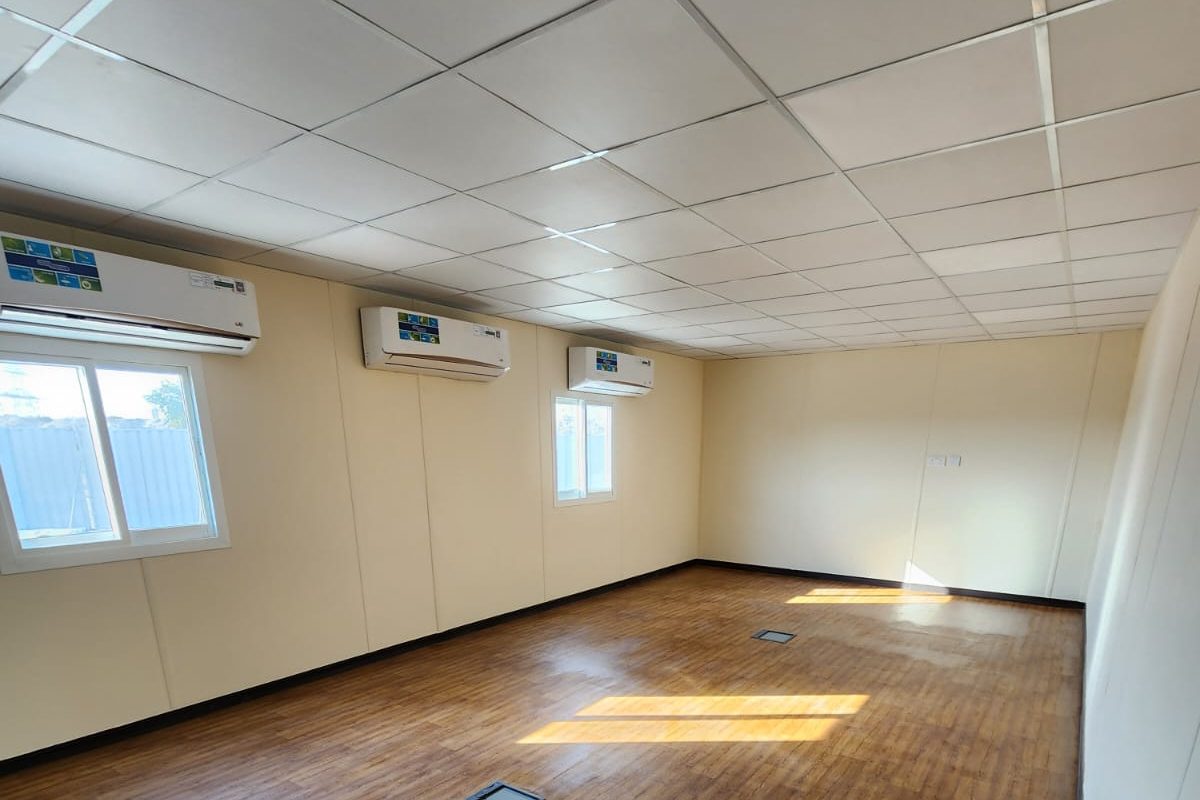 Open-plan office hall with three-way air conditioning