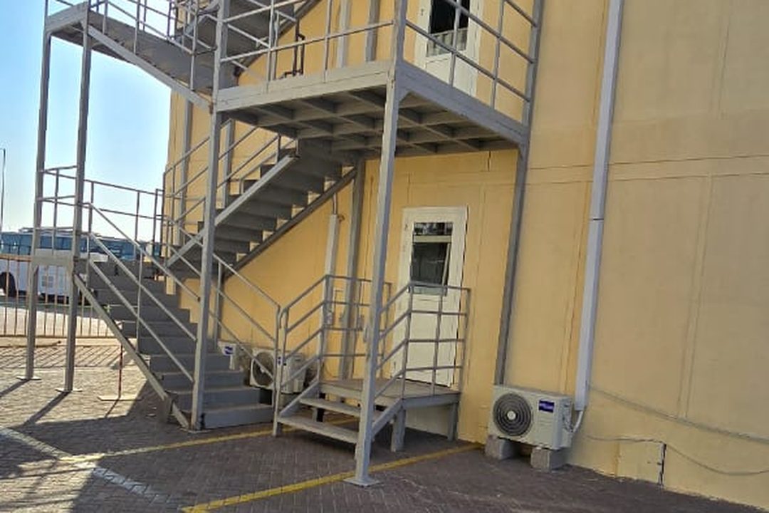 Galvanised steel escape stair serving all floors