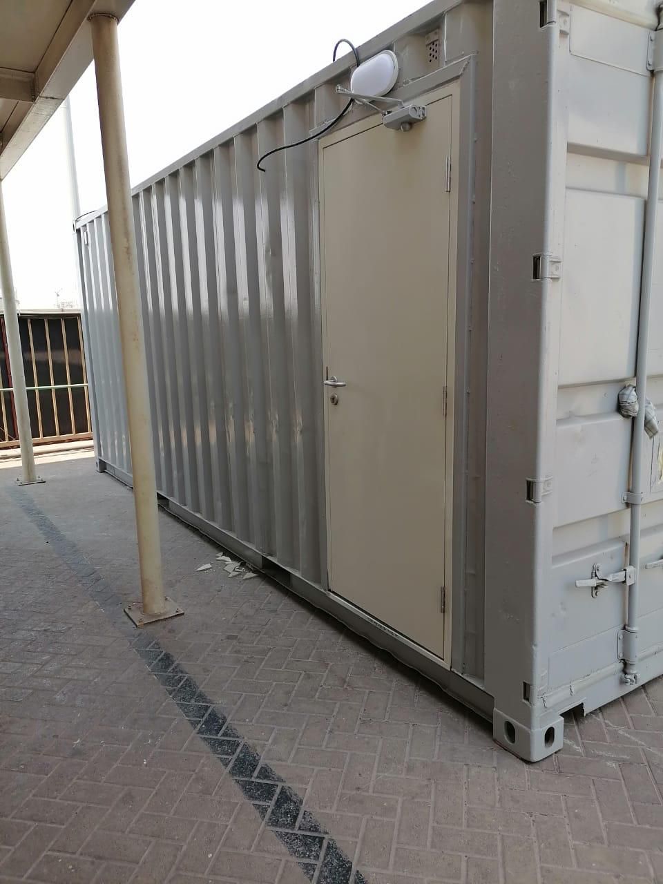 Added personnel door with closer and external light